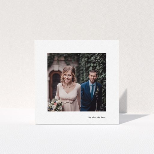 Photo Wedding Thank You Card Design - "We tied the knot" A photo wedding thank you card design titled "We tied the knot". It is a square (148mm x 148mm) card in a square orientation. It is a photographic photo wedding thank you card with room for 1 photo. "We tied the knot" is available as a folded card, with mainly white colouring.