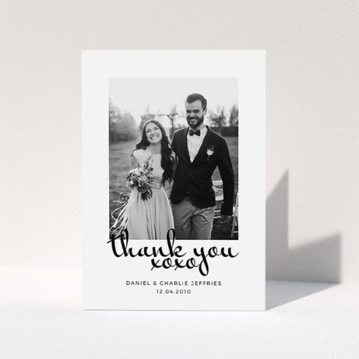 Photo Wedding Thank You Card Design - "XoXo" A photo wedding thank you card design named "XoXo". It is an A5 card in a portrait orientation. It is a photographic photo wedding thank you card with room for 1 photo. "XoXo" is available as a folded card, with mainly white colouring.