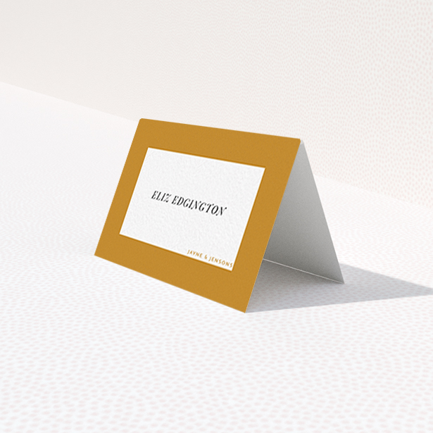 A place setting card design called "Big Copper". It is an 85 x 55mm card in a landscape orientation. "Big Copper" is available as a folded card, with mainly dark orange colouring.