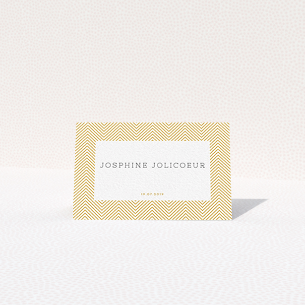 A place setting card template titled "Golden Lines". It is an 85 x 55mm card in a landscape orientation. "Golden Lines" is available as a folded card, with tones of gold and white.