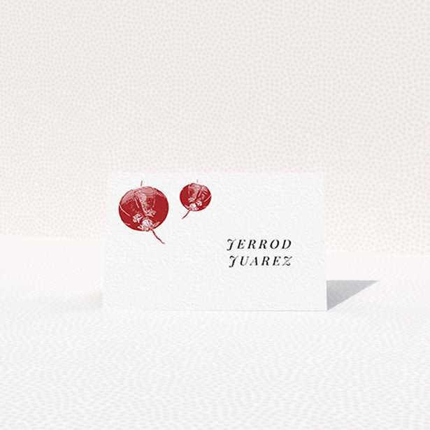 A place setting card called "Shanghai Nights". It is an 85 x 55mm card in a landscape orientation. "Shanghai Nights" is available as a folded card, with tones of red and white.
