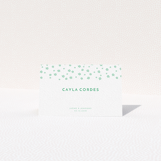 A place setting card design named "Stars at Night". It is an 85 x 55mm card in a landscape orientation. "Stars at Night" is available as a folded card, with tones of green and white.