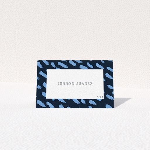 Table Place Card Design - "Blue strokes" A table place card design titled "Blue strokes". It is an 85 x 55mm card in a landscape orientation. "Blue strokes" is available as a folded card, with tones of blue and white.