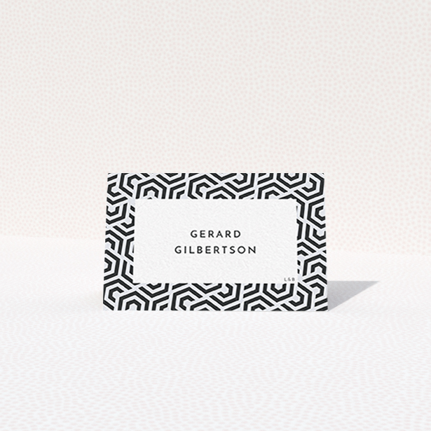 A table place card design titled "Geometric corners". It is an 85 x 55mm card in a landscape orientation. "Geometric corners" is available as a folded card, with tones of navy blue and white.