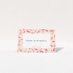 A table place card design named "Petal avalanche". It is an 85 x 55mm card in a landscape orientation. "Petal avalanche" is available as a folded card, with tones of pink, red and white.