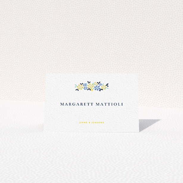 A table place card template titled "Simplistic Bouquet". It is an 85 x 55mm card in a landscape orientation. "Simplistic Bouquet" is available as a folded card, with tones of white and blue.
