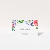 A table place card design called "The flowerbed". It is an 85 x 55mm card in a landscape orientation. "The flowerbed" is available as a folded card, with tones of white and green.