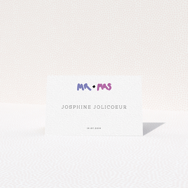 A table place card design named "The New Mr and Mrs". It is an 85 x 55mm card in a landscape orientation. "The New Mr and Mrs" is available as a folded card, with tones of white and blue.