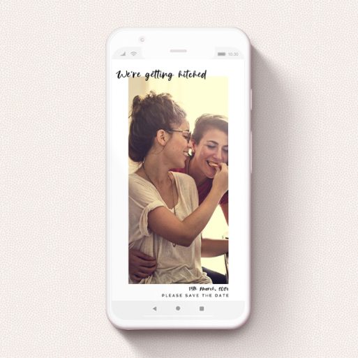 Text Message Save The Date Design - "Top and Bottom Photo" A text message save the date called "Top and Bottom Photo". It is a smartphone screen sized save the date in a portrait orientation. It is a photographic text message save the date with room for 1 photo. "Top and Bottom Photo" is available as a flat save the date, with mainly white colouring.