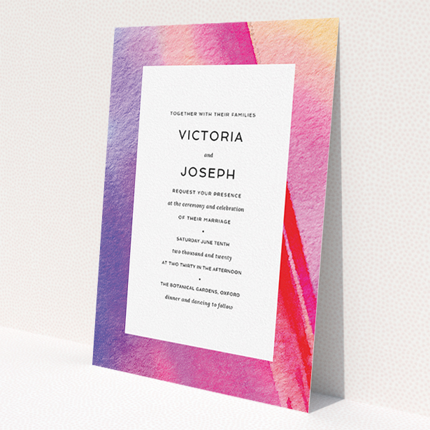 A wedding invite card design called "Abstract Pink Watercolour". It is an A5 invite in a portrait orientation. "Abstract Pink Watercolour" is available as a flat invite, with tones of vibrant pink, purple and red.