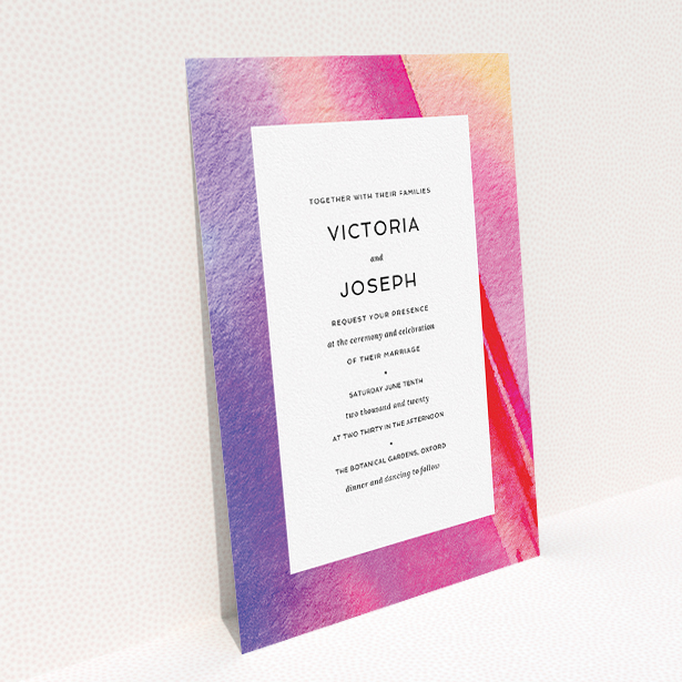 A wedding invite card design called "Abstract Pink Watercolour". It is an A5 invite in a portrait orientation. "Abstract Pink Watercolour" is available as a flat invite, with tones of vibrant pink, purple and red.