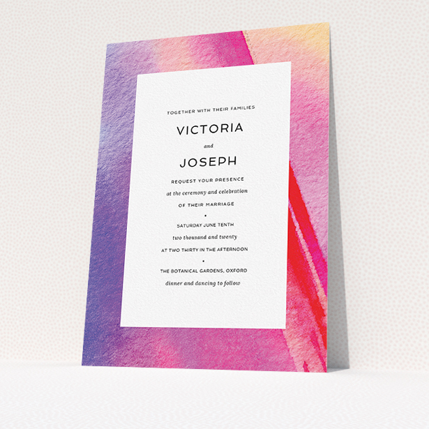A wedding invite card design called "Abstract Pink Watercolour". It is an A5 invite in a portrait orientation. "Abstract Pink Watercolour" is available as a flat invite, with tones of vibrant pink, purple and red.