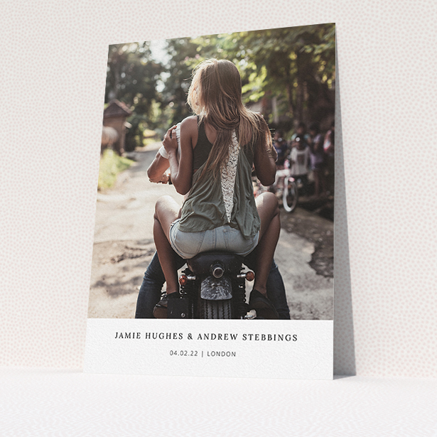 A wedding invite card named "Maddox Street". It is an A5 invite in a portrait orientation. It is a photographic wedding invite card with room for 1 photo. "Maddox Street" is available as a flat invite, with mainly white colouring.