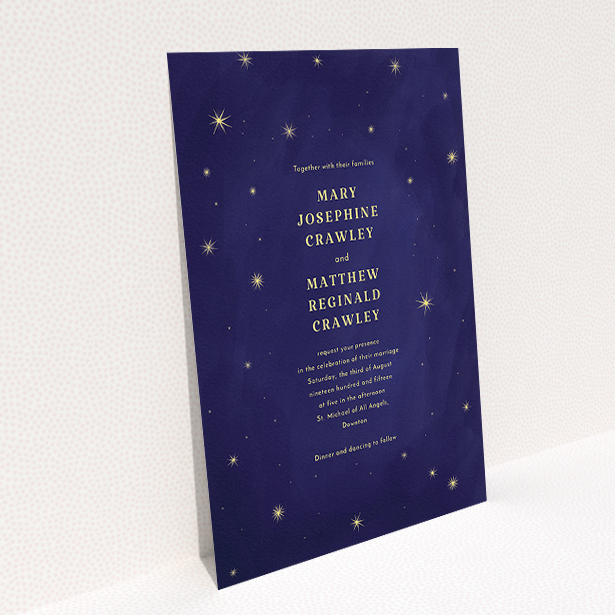 A wedding invite card called "Sky at night". It is an A5 invite in a portrait orientation. "Sky at night" is available as a flat invite, with tones of dark blue and yellow.
