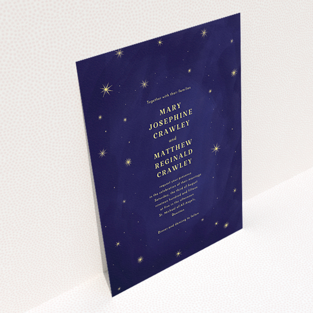 A wedding invite card called "Sky at night". It is an A5 invite in a portrait orientation. "Sky at night" is available as a flat invite, with tones of dark blue and yellow.