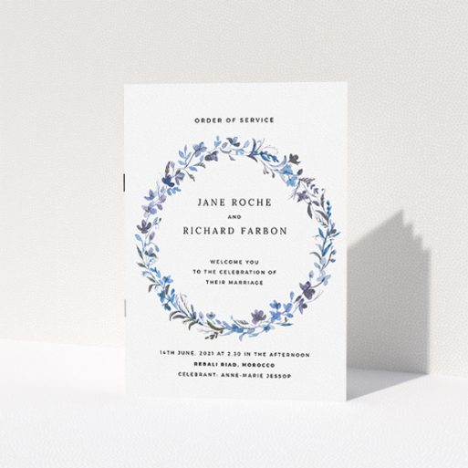 Wedding Order Of Service Design - "Blue Wildflower" A wedding order of service design titled "Blue Wildflower". It is an A5 booklet in a portrait orientation. "Blue Wildflower" is available as a folded booklet booklet, with tones of light blue, purple and grey.