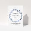 A wedding order of service design titled "Blue Wildflower". It is an A5 booklet in a portrait orientation. "Blue Wildflower" is available as a folded booklet booklet, with tones of light blue, purple and grey.