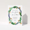 A wedding order of service called "Summer Whirl Wreath". It is an A5 booklet in a portrait orientation. "Summer Whirl Wreath" is available as a folded booklet booklet, with tones of green, dark blue and orange.