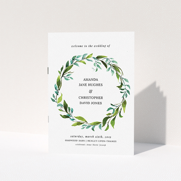 A wedding order of service design named "Watercolour Wreath Cover". It is an A5 booklet in a portrait orientation. "Watercolour Wreath Cover" is available as a folded booklet booklet, with tones of green and light blue.
