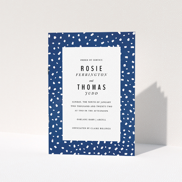 A wedding order of service template titled "White on Blue Polka dots". It is an A5 booklet in a portrait orientation. "White on Blue Polka dots" is available as a folded booklet booklet, with mainly blue colouring.