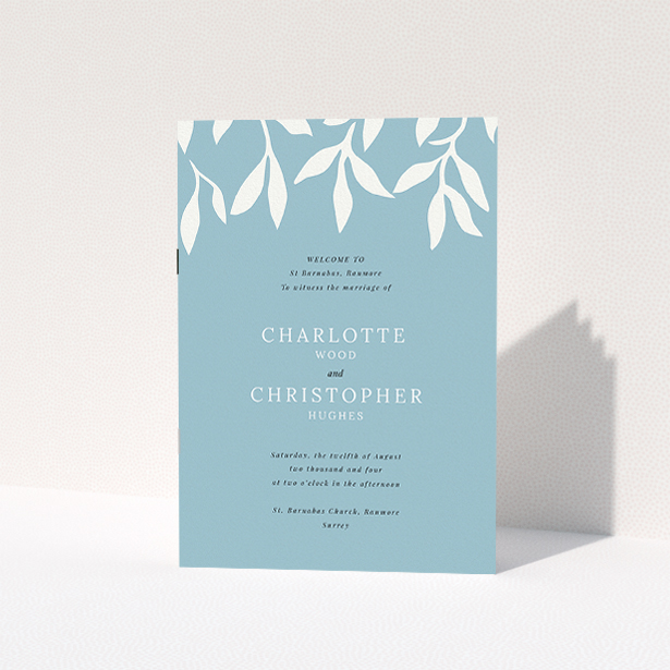 A wedding order of service named "Winter bloom". It is an A5 booklet in a portrait orientation. "Winter bloom" is available as a folded booklet booklet, with tones of blue and white.