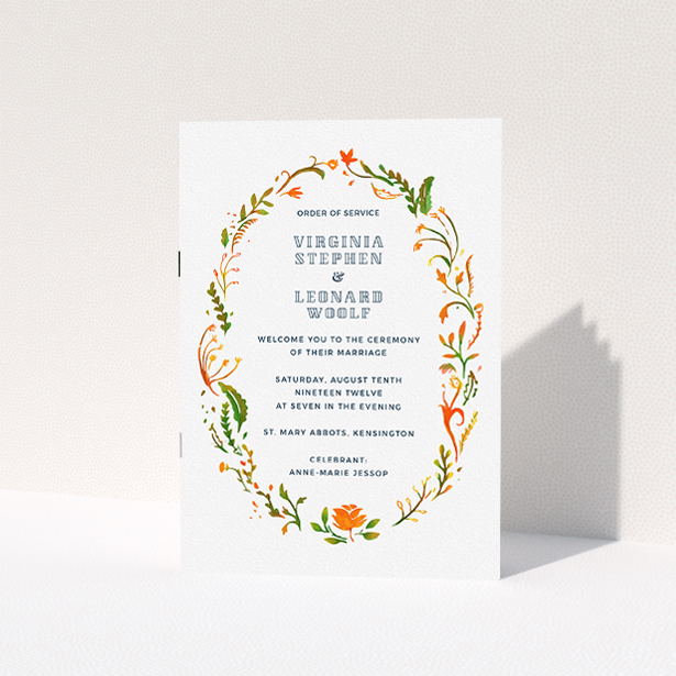 A wedding program named "Deco Wreath". It is an A5 booklet in a portrait orientation. "Deco Wreath" is available as a folded booklet booklet, with tones of orange, green and yellow.