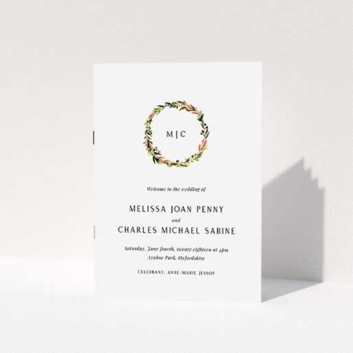 Wedding Program Design - "Floral Monogram" A wedding program named "Floral Monogram". It is an A5 booklet in a portrait orientation. "Floral Monogram" is available as a folded booklet booklet, with tones of white and Orange.