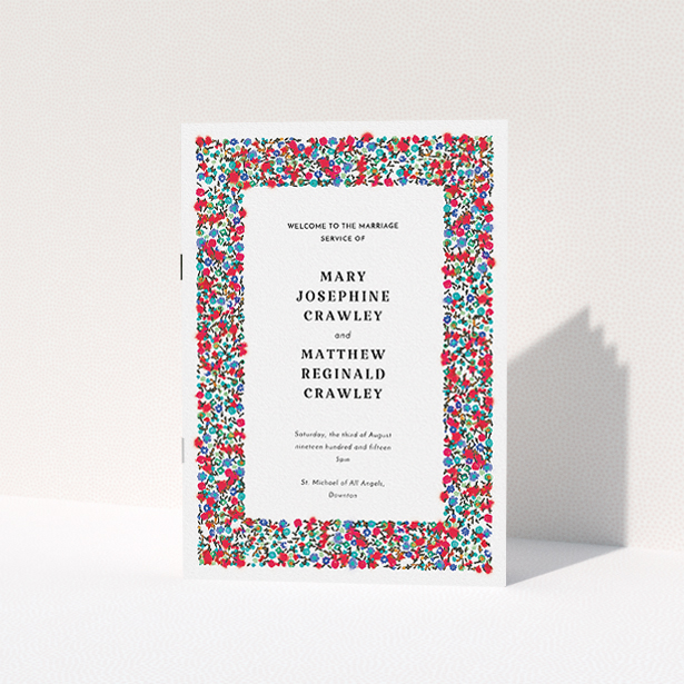 A wedding program called "Summer from a distance". It is an A5 booklet in a portrait orientation. "Summer from a distance" is available as a folded booklet booklet, with tones of white and red.