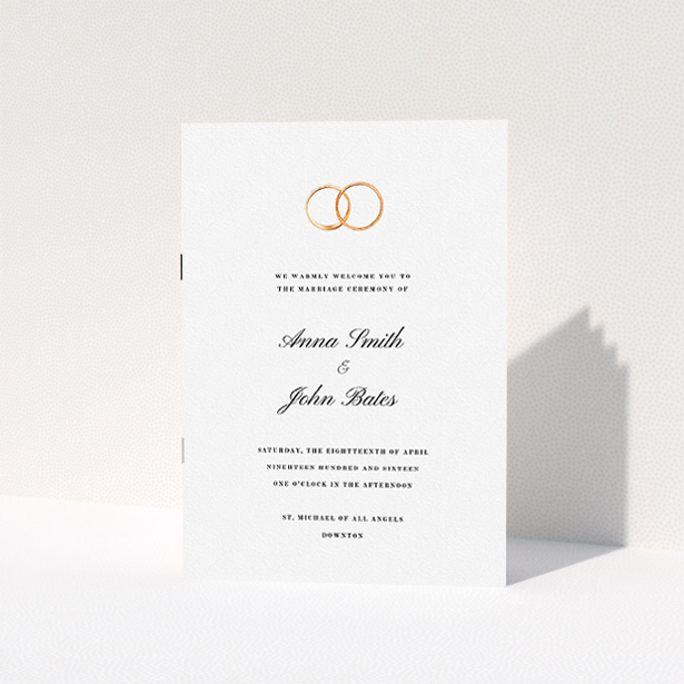 A wedding program called "The newlyweds". It is an A5 booklet in a portrait orientation. "The newlyweds" is available as a folded booklet booklet, with tones of white and gold.