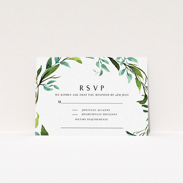 A wedding response card named "Greek Wreath". It is an A7 card in a landscape orientation. "Greek Wreath" is available as a flat card, with tones of green and light blue.