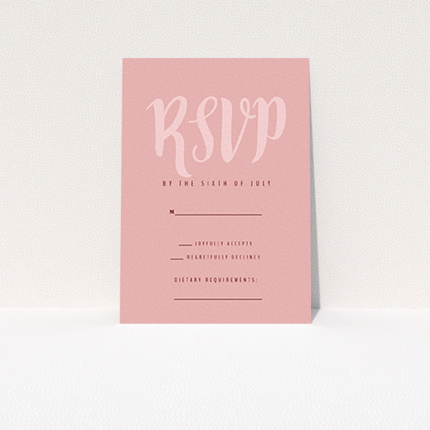 A wedding response card called "Pastel Pink Typography". It is an A7 card in a portrait orientation. "Pastel Pink Typography" is available as a flat card, with mainly pink colouring.