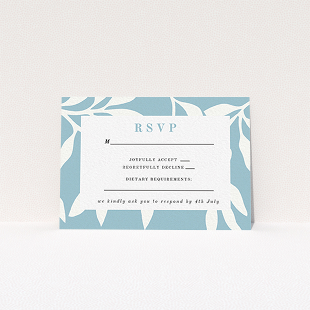 A wedding response card template titled "Winter bloom". It is an A7 card in a landscape orientation. "Winter bloom" is available as a flat card, with tones of blue and white.