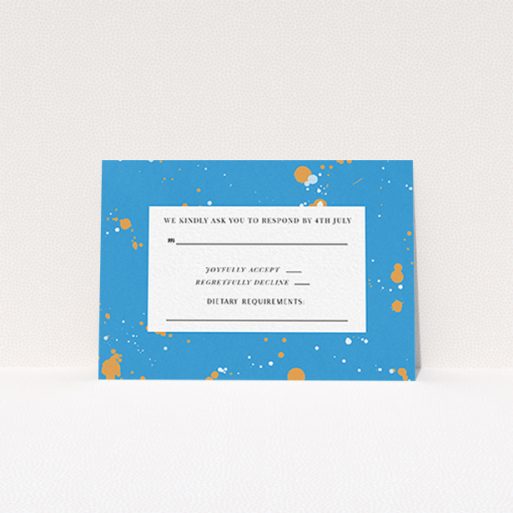 Wedding RSVP Card Design Design - "Orange Splatters" A wedding rsvp card design named "Orange Splatters". It is an A7 card in a landscape orientation. "Orange Splatters" is available as a flat card, with tones of light blue and orange.