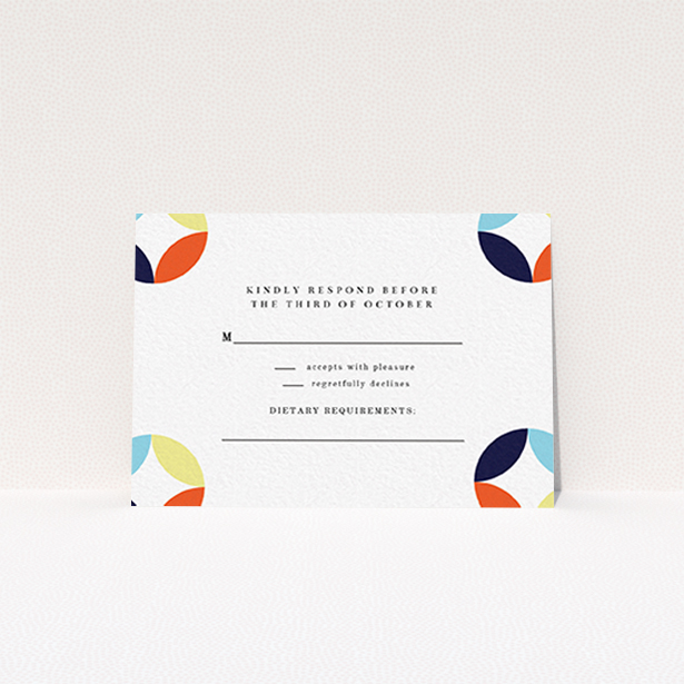 A wedding rsvp card named "Round and Round". It is an A7 card in a landscape orientation. "Round and Round" is available as a flat card, with mainly light blue colouring.