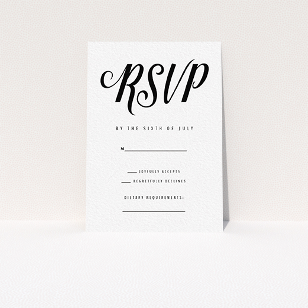 A wedding rsvp card named "Slant Typography Black". It is an A7 card in a portrait orientation. "Slant Typography Black" is available as a flat card, with tones of black and white.