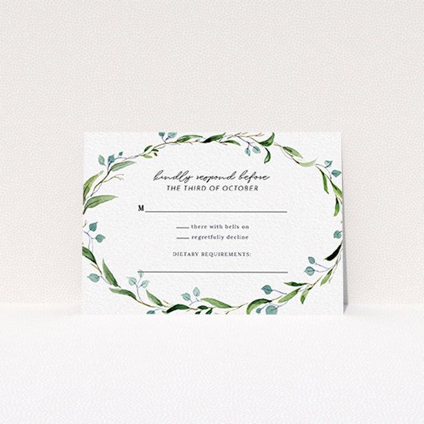 A wedding rsvp card named "Thin Watercolour Wreath". It is an A7 card in a landscape orientation. "Thin Watercolour Wreath" is available as a flat card, with tones of blue and green.