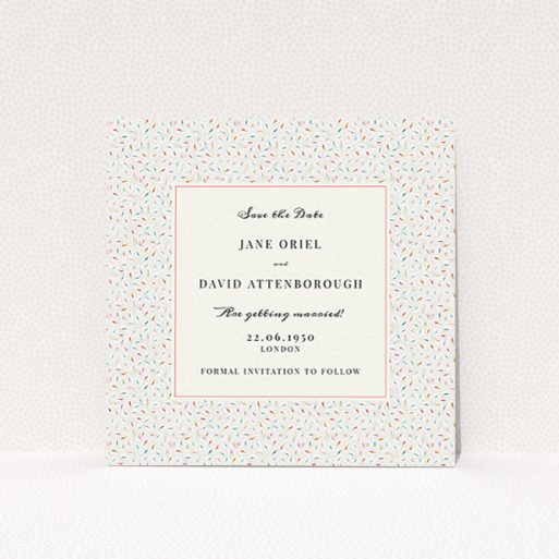 Wedding Save The Date Card Design - "A hint of confetti" A wedding save the date card named "A hint of confetti". It is a square (148mm x 148mm) card in a square orientation. "A hint of confetti" is available as a flat card, with tones of light cream and green.