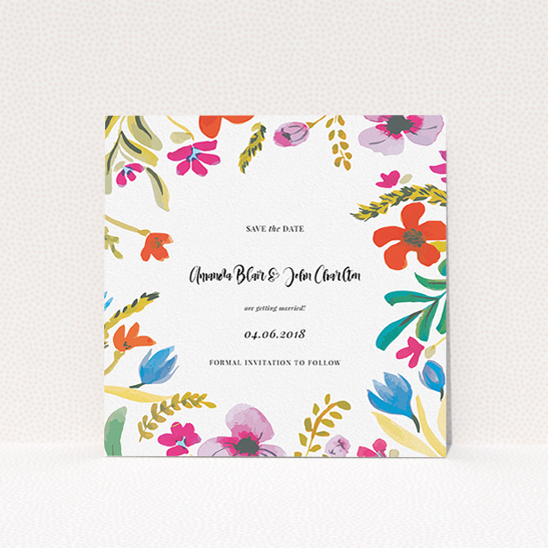 A wedding save the date card named "Botanical Pop". It is a square (148mm x 148mm) card in a square orientation. "Botanical Pop" is available as a flat card, with tones of white and red.