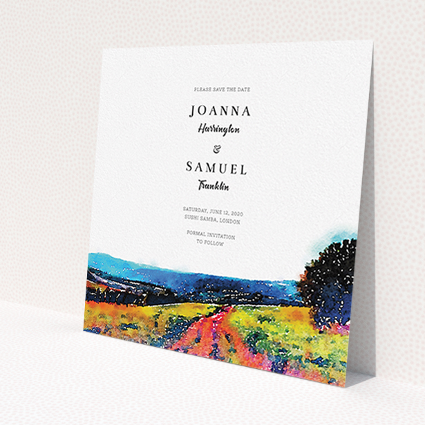 A wedding save the date card template titled "Country Road". It is a square (148mm x 148mm) card in a square orientation. "Country Road" is available as a flat card, with tones of white, orange and light blue.