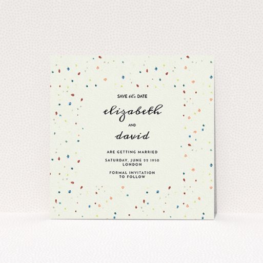 Wedding Save The Date Card Design - "Crayon splinters" A wedding save the date card called "Crayon splinters". It is a square (148mm x 148mm) card in a square orientation. "Crayon splinters" is available as a flat card, with tones of pale cream and orange.