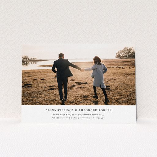 Wedding Save The Date Card Design - "Duke of York Square" A wedding save the date card design titled "Duke of York Square". It is an A5 card in a landscape orientation. It is a photographic wedding save the date card with room for 1 photo. "Duke of York Square" is available as a flat card, with mainly white colouring.