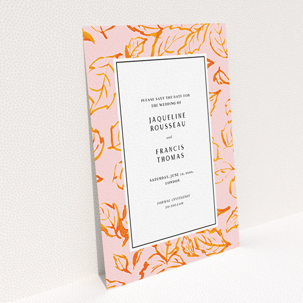 A wedding save the date card template titled "Falling Foliage". It is an A6 card in a portrait orientation. "Falling Foliage" is available as a flat card, with tones of pink and orange.