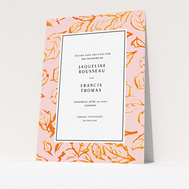 A wedding save the date card template titled "Falling Foliage". It is an A6 card in a portrait orientation. "Falling Foliage" is available as a flat card, with tones of pink and orange.