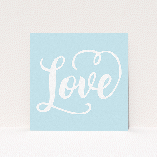 A wedding save the date card called "Folded Typography". It is a square (148mm x 148mm) card in a square orientation. "Folded Typography" is available as a flat card, with tones of blue and white.