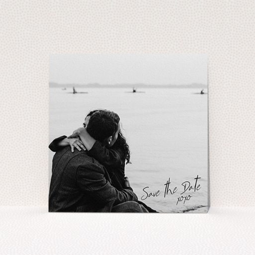 Wedding Save The Date Card Design - "Full Page Photo Square" A wedding save the date card design called "Full Page Photo Square". It is a square (148mm x 148mm) card in a square orientation. It is a photographic wedding save the date card with room for 1 photo. "Full Page Photo Square" is available as a flat card, with mainly black colouring.