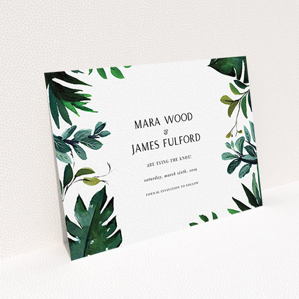 A wedding save the date card called "Gap in the Jungle". It is an A6 card in a landscape orientation. "Gap in the Jungle" is available as a flat card, with tones of blue and green.