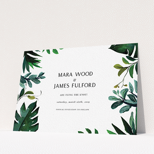 A wedding save the date card called "Gap in the Jungle". It is an A6 card in a landscape orientation. "Gap in the Jungle" is available as a flat card, with tones of blue and green.