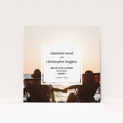 Wedding Save The Date Card Design - "In the suburbs" A wedding save the date card design called "In the suburbs". It is a square (148mm x 148mm) card in a square orientation. It is a photographic wedding save the date card with room for 1 photo. "In the suburbs" is available as a flat card, with mainly white colouring.