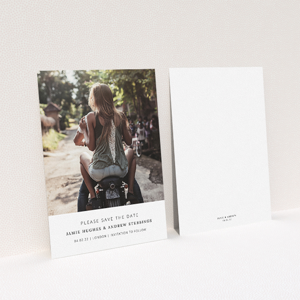 A wedding save the date card named "Maddox Street". It is an A5 card in a portrait orientation. It is a photographic wedding save the date card with room for 1 photo. "Maddox Street" is available as a flat card, with mainly white colouring.