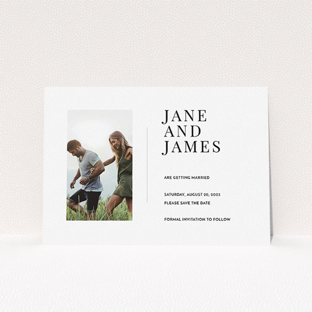 A wedding save the date card design called "Modern postcard". It is an A5 card in a landscape orientation. It is a photographic wedding save the date card with room for 1 photo. "Modern postcard" is available as a flat card, with mainly white colouring.
